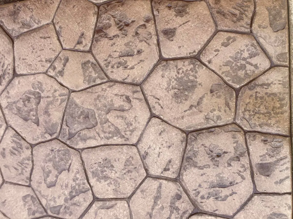 A close up of the floor tiles in a building
