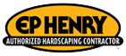 A yellow and black logo for the john henry hardscaping company.
